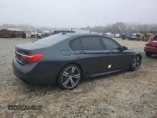 2019 BMW 7 Series 750i with VIN WBA7F0C54KGM25281, listed as a Copart auction lot 84741334 with 76,472 mi miles and Salvage Title. Bid and sale history available at carsss.com. Image 3.