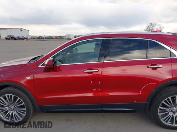 2024 Cadillac XT4 AWD Premium Luxury z VIN 1GYFZDR40RF102464, wystawiony jako IAAI lot #41968335 z przebiegiem 25 676 mil mil oraz . Historia ofert i sprzedaży dostępna na DreamBid. Obrazek 14.