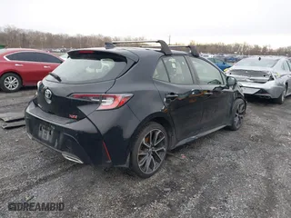 2021 Toyota Corolla Hatchback XSE with VIN JTNC4MBE5M3106428, listed as a IAAI auction lot 41497937 with 94,951 mi miles. Bid and sale history available at carsss.com. Image 4.