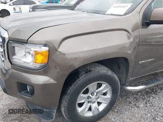 2016 GMC Canyon 2WD SLE with VIN 1GTG5CE34G1154106, listed as a IAAI auction lot 41451107 with 245,087 mi miles. Bid and sale history available at carsss.com. Image 6.
