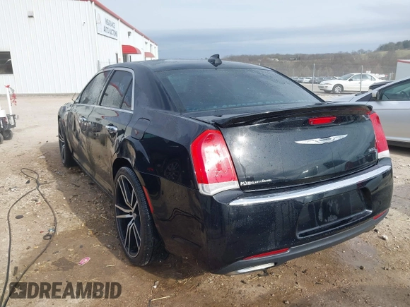 2015 Chrysler 300 C with VIN 2C3CCAEG8FH908477, listed as a IAAI auction lot 41702256 with 140,017 mi miles and . Bid and sale history available at carsss.com. Image 3.