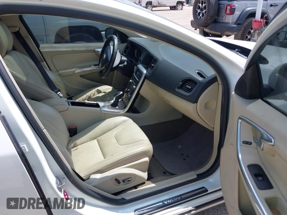 2014 Volvo S60 T5 z VIN YV1612FSXE2277644, wystawiony jako IAAI lot #42405453 z przebiegiem Nie podano mil oraz . Historia ofert i sprzedaży dostępna na DreamBid. Obrazek 5.