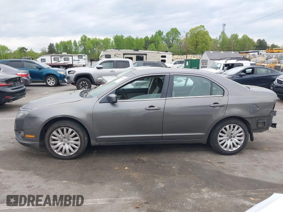 2011 Ford Fusion SE with VIN 3FAHP0HA1BR203046, listed as a IAAI auction lot 42011121 with 302,078 mi miles. Bid and sale history available at carsss.com. Image 15.