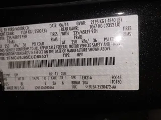 2014 Ford Escape Titanium with VIN 1FMCU9J95EUD85537, listed as a IAAI auction lot 41472236 with 154,796 mi miles. Bid and sale history available at carsss.com. Image 9.