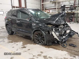 2015 Ford Escape SE with VIN 1FMCU9G91FUC49902, listed as a IAAI auction lot 41947883 with 140,670 mi miles. Bid and sale history available at carsss.com. Image 1.