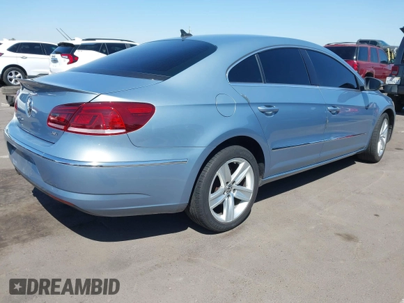2013 Volkswagen CC Sport with VIN WVWBP7AN0DE567504, listed as a IAAI auction lot 42003695 with 174,528 mi miles. Bid and sale history available at carsss.com. Image 4.