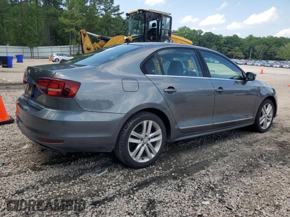 2017 Volkswagen Jetta SEL z VIN 3VWL17AJ9HM407735, wystawiony jako Copart lot #60257715 z przebiegiem 124 393 mil mil oraz Czysty tytuł • Clean title. Historia ofert i sprzedaży dostępna na DreamBid. Obrazek 3.