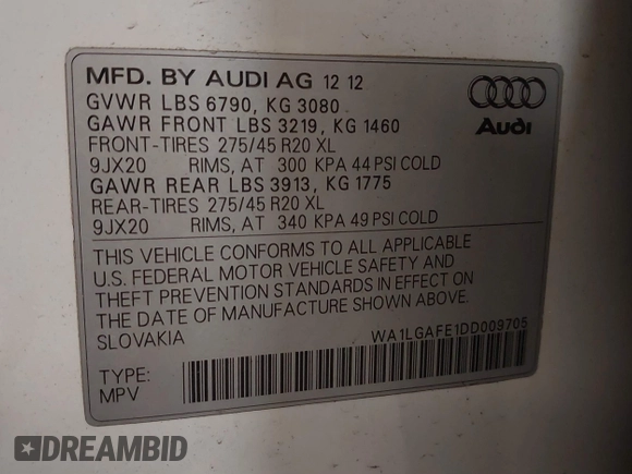 2013 Audi Q7 Premium Plus with VIN WA1LGAFE1DD009705, listed as a IAAI auction lot 41390712 with 99,649 mi miles and . Bid and sale history available at DreamBid. Image 9.