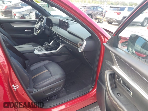 2025 Mazda CX-70 Premium Plus with VIN JM3KJEHA4S1112319, listed as a IAAI auction lot 41908798 with 7,712 mi miles and . Bid and sale history available at DreamBid. Image 5.