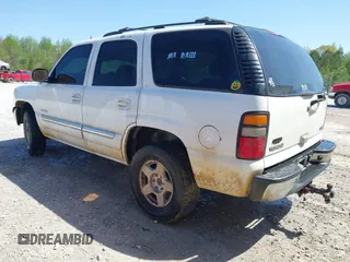 2005 GMC Yukon SLT with VIN 1GKEC13T35J128179, listed as a IAAI auction lot 41985296 with 255,582 mi miles. Bid and sale history available at carsss.com. Image 3.