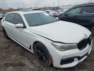 2016 BMW 7 Series 740i with VIN WBA7E2C50GG714647, listed as a IAAI auction lot 41745442 with 134,399 mi miles and . Bid and sale history available at carsss.com. Image 1.