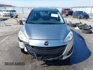2013 Mazda 5 Sport with VIN JM1CW2BL6D0146696, listed as a IAAI auction lot 41657255 with 142,939 mi miles and . Bid and sale history available at DreamBid. Image 13.