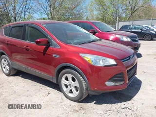 2015 Ford Escape SE z VIN 1FMCU0G79FUC75335, wystawiony jako IAAI lot #42222863 z przebiegiem 132 592 mil mil oraz . Historia ofert i sprzedaży dostępna na DreamBid. Obrazek 1.