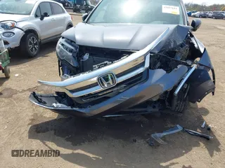 2019 Honda Pilot EX-L with VIN 5FNYF6H55KB082929, listed as a IAAI auction lot 42057611 with 93,532 mi miles and . Bid and sale history available at DreamBid. Image 6.