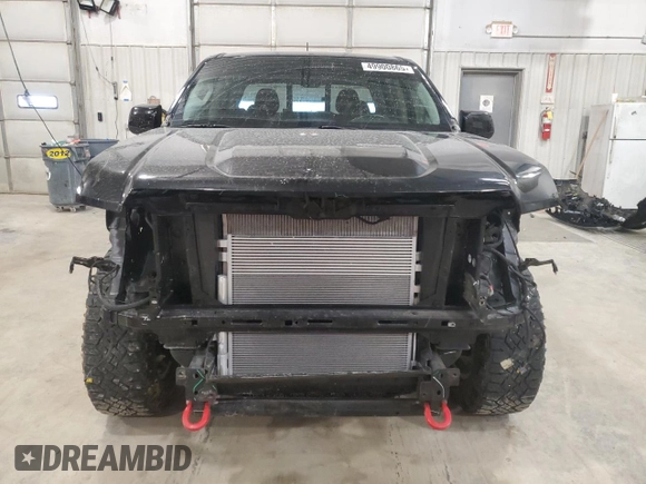 2021 GMC Canyon 4WD AT4 w/Cloth with VIN 1GTG6FEN2M1265863, listed as a Copart auction lot 49900865 with 50,102 mi miles and Salvage Title. Bid and sale history available at carsss.com. Image 5.