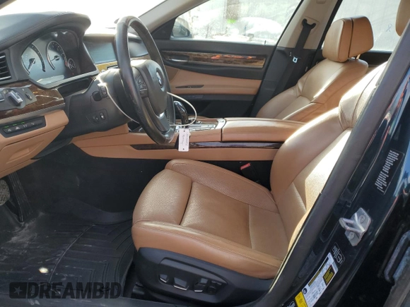 2013 BMW 7 Series 750i xDrive with VIN WBAYB6C50DD223786, listed as a Copart auction lot 87579345 with 143,523 mi miles and Salvage title. Bid and sale history available at DreamBid. Image 7.