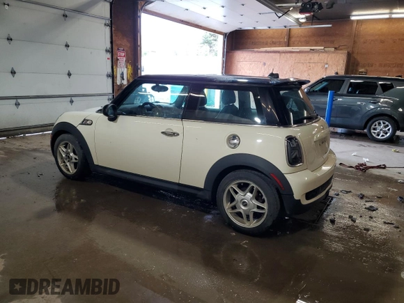 2009 MINI Hardtop S with VIN WMWMF73509TW83066, listed as a Copart auction lot 58603205 with 113,242 mi miles and Salvage title. Bid and sale history available at DreamBid. Image 2.