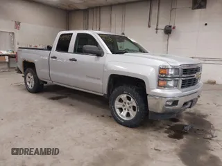 2014 Chevrolet Silverado 1500 LT with VIN 1GCVKREC0EZ355177, listed as a IAAI auction lot 41909418 with 131,037 mi miles. Bid and sale history available at carsss.com. Image 1.
