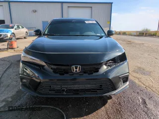 2023 Honda Civic Sport Touring z VIN 19XFL1H85PE402177, wystawiony jako Copart lot #52611605 z przebiegiem 56 306 mil mil oraz Szkoda całkowita • Salvage title. Historia ofert i sprzedaży dostępna na DreamBid. Obrazek 5.