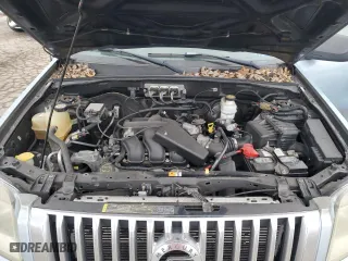 2008 Mercury Mariner with VIN 4M2CU81158KJ07112, listed as a Copart auction lot 82240914 with 128,558 mi miles and Salvage Title. Bid and sale history available at carsss.com. Image 13.