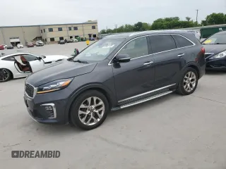 2019 Kia Sorento SX z VIN 5XYPK4A52KG465791, wystawiony jako Copart lot #53827105 z przebiegiem 119 036 mil mil oraz Czysty tytuł • Clean title. Historia ofert i sprzedaży dostępna na DreamBid. Obrazek 1.