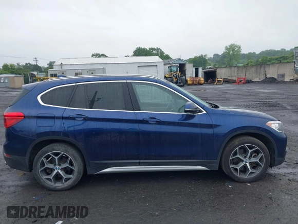 2018 BMW X1 xDrive28i with VIN WBXHT3C32J5L33213, listed as a IAAI auction lot 42513235 with 75,918 mi miles and . Bid and sale history available at DreamBid. Image 13.
