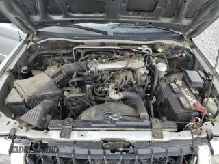 2001 Mitsubishi Montero XLS z VIN JA4LS31H71P016485, wystawiony jako Copart lot #55179455 z przebiegiem 293 612 mil mil oraz Szkody całkowita. Historia ofert i sprzedaży dostępna na DreamBid. Obrazek 11.