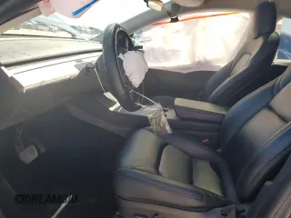 2022 Tesla Model Y Long Range z VIN 7SAYGAEE4NF543503, wystawiony jako Copart lot #47143155 z przebiegiem 53 874 mil mil oraz Szkody całkowita. Historia ofert i sprzedaży dostępna na DreamBid. Obrazek 7.