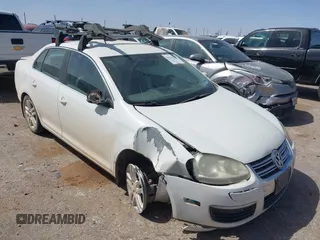 2009 Volkswagen Jetta z VIN 3VWAL71K19M178303, wystawiony jako IAAI lot #41935820 z przebiegiem 231 493 mil mil oraz . Historia ofert i sprzedaży dostępna na DreamBid. Obrazek 1.