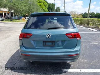 2019 Volkswagen Tiguan SE with VIN 3VV3B7AX8KM171057, listed as a IAAI auction lot 42209509 with 99,437 mi miles and . Bid and sale history available at DreamBid. Image 16.