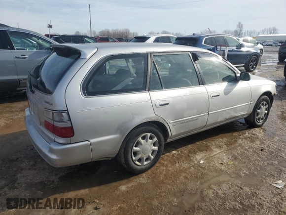 1999 Toyota Corolla с VIN AE1000286393, выставлен на аукционе Copart как лот 42634225 с пробегом 80 160 миль миль и Чистый • Clean title. История ставок и продаж доступна на DreamBid. Изображение 3.