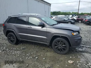 2017 Jeep Grand Cherokee Altitude z VIN 1C4RJFAG9HC720250, wystawiony jako Copart lot #56956155 z przebiegiem 138 879 mil mil oraz Szkoda całkowita • Salvage title. Historia ofert i sprzedaży dostępna na DreamBid. Obrazek 4.