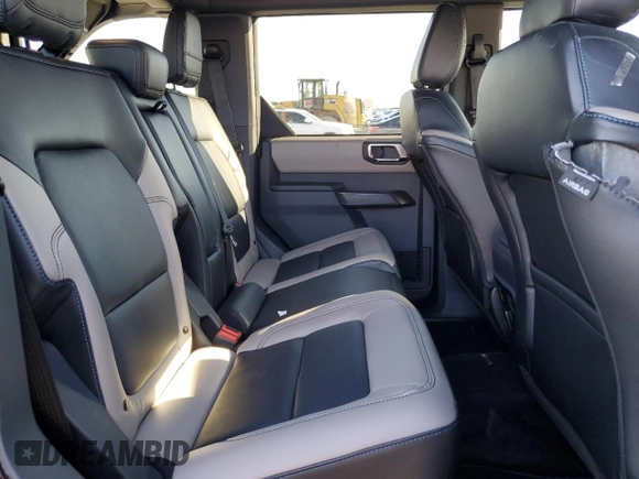 2024 Ford Bronco Wildtrak с VIN 1FMEE2BP3RLB31198, выставлен на аукционе Copart как лот 48140845 с пробегом 2 609 миль миль и Списание • Salvage title. История ставок и продаж доступна на DreamBid. Изображение 11.