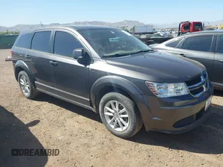 2015 Dodge Journey American Value z VIN 3C4PDCAB2FT752881, wystawiony jako IAAI lot #42116953 z przebiegiem 173 644 mil mil oraz . Historia ofert i sprzedaży dostępna na DreamBid. Obrazek 1.