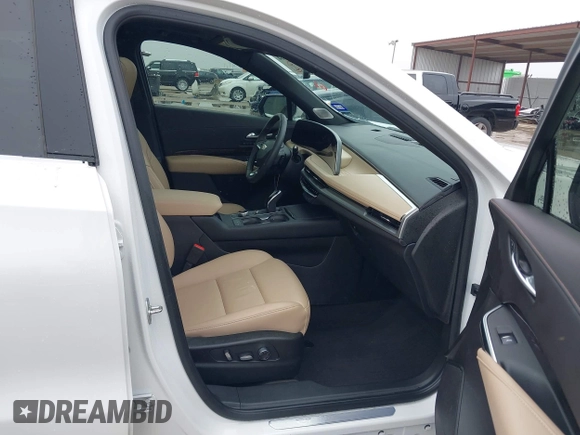 2024 Cadillac XT4 FWD Premium Luxury с VIN 1GYFZCR42RF234829, выставлен на аукционе IAAI как лот 42145964 с пробегом 12 381 миль миль и . История ставок и продаж доступна на DreamBid. Изображение 5.