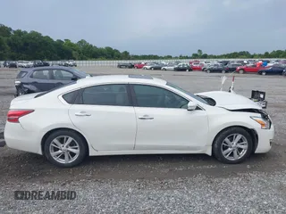 2015 Nissan Altima 2.5 with VIN 1N4AL3APXFN405079, listed as a IAAI auction lot 42463237 with 244,848 mi miles and . Bid and sale history available at DreamBid. Image 13.