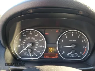 2013 BMW 1 Series 135i with VIN WBAUC9C54DVM13873, listed as a Copart auction lot 82657734 with 78,021 mi miles and Salvage title. Bid and sale history available at DreamBid. Image 9.