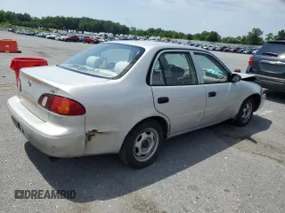1999 Toyota Corolla VE z VIN 2T1BR12E3XC107587, wystawiony jako Copart lot #62314265 z przebiegiem 143 734 mil mil oraz Szkoda całkowita • Salvage title. Historia ofert i sprzedaży dostępna na DreamBid. Obrazek 3.