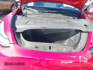 2022 Tesla Model Y Long Range z VIN 7SAYGDEE1NF385414, wystawiony jako IAAI lot #41660542 z przebiegiem 54 075 mil mil oraz . Historia ofert i sprzedaży dostępna na DreamBid. Obrazek 10.