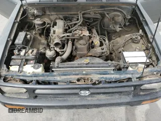1993 Toyota Pickup z VIN 4TARN81AXPZ093111, wystawiony jako Copart lot #50526505 z przebiegiem 163 893 mil mil oraz Szkoda całkowita • Salvage title. Historia ofert i sprzedaży dostępna na DreamBid. Obrazek 11.