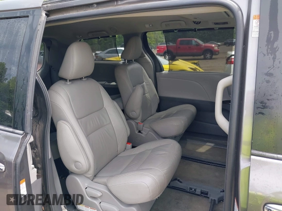 2015 Toyota Sienna Limited with VIN 5TDDK3DC6FS111675, listed as a IAAI auction lot 42240747 with 124,967 mi miles and . Bid and sale history available at DreamBid. Image 8.