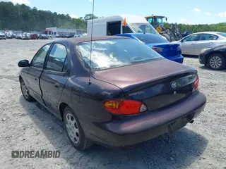 1999 Hyundai Elantra z VIN KMHJF25F1XU806648, wystawiony jako IAAI lot #42331073 z przebiegiem 196 577 mil mil oraz . Historia ofert i sprzedaży dostępna na DreamBid. Obrazek 3.