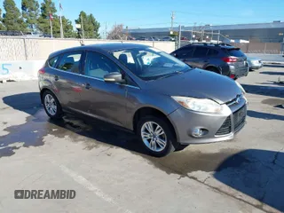 2012 Ford Focus SEL with VIN 1FAHP3M25CL180094, listed as a IAAI auction lot 41637412 with 196,830 mi miles. Bid and sale history available at carsss.com. Image 1.