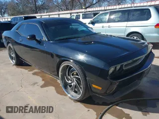 2012 Dodge Challenger SXT Plus with VIN 2C3CDYAG5CH208729, listed as a IAAI auction lot 41204390 with 216,067 mi miles. Bid and sale history available at carsss.com. Image 1.