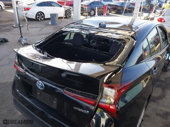 2021 Toyota Prius L Eco with VIN JTDKAMFU2M3134178, listed as a IAAI auction lot 41975477 with 26,936 mi miles. Bid and sale history available at carsss.com. Image 17.