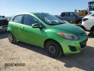 2013 Mazda Mazda2 Sport with VIN JM1DE1KY0D0157951, listed as a Copart auction lot 53934215 with 187,534 mi miles and Salvage Title. Bid and sale history available at carsss.com. Image 4.