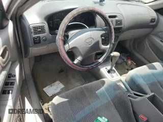 2001 Toyota Corolla CE с VIN 1NXBR12E41Z522052, выставлен на аукционе Copart как лот 64557815 с пробегом 199 660 миль миль и Списание • Salvage title. История ставок и продаж доступна на DreamBid. Изображение 8.