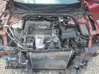 2020 Honda Civic LX z VIN 19XFC2F61LE024036, wystawiony jako Copart lot #56090685 z przebiegiem 71 290 mil mil oraz Szkoda całkowita • Salvage title. Historia ofert i sprzedaży dostępna na DreamBid. Obrazek 11.