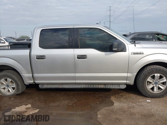 2015 Ford F-150 XLT with VIN 1FTEW1C8XFFD08150, listed as a IAAI auction lot 41645386 with 170,276 mi miles and . Bid and sale history available at carsss.com. Image 12.