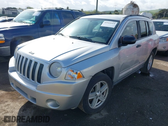 2008 Jeep Compass Sport with VIN 1J8FT47W18D728894, listed as a IAAI auction lot 41925519 with 154,124 mi miles. Bid and sale history available at carsss.com. Image 2.